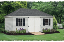 Standard Villa 12′ x 20′ • Heritage grey vinyl siding, white doors and trim, black shutters, black architectural shingles, larger windows