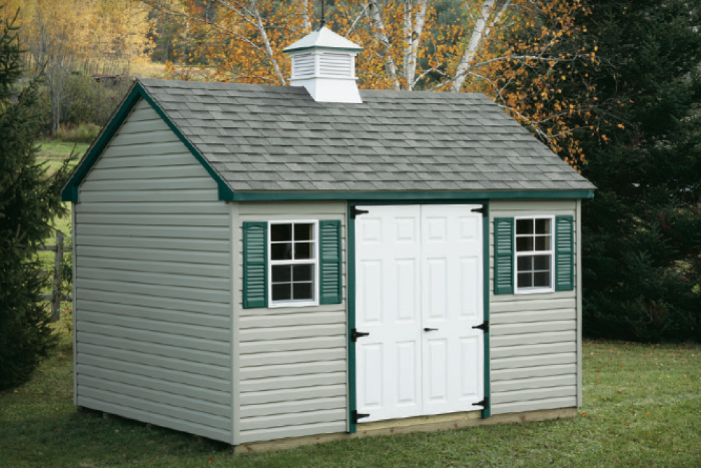 Standard Cape Cod 10′ x 12′ • Clay vinyl siding, green trim and shutters, slate architectural shingles